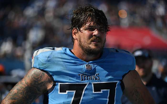 Tennessee Titans offensive tackle Taylor Lewan (77) on the sideline during the second half against the Indianapolis Colts at Nissan Stadium.